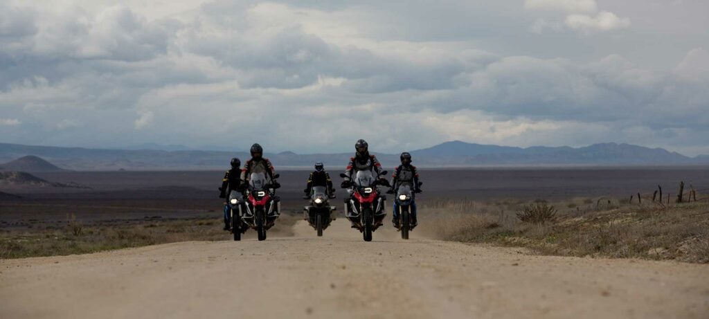 motorcyclists on a dirt road