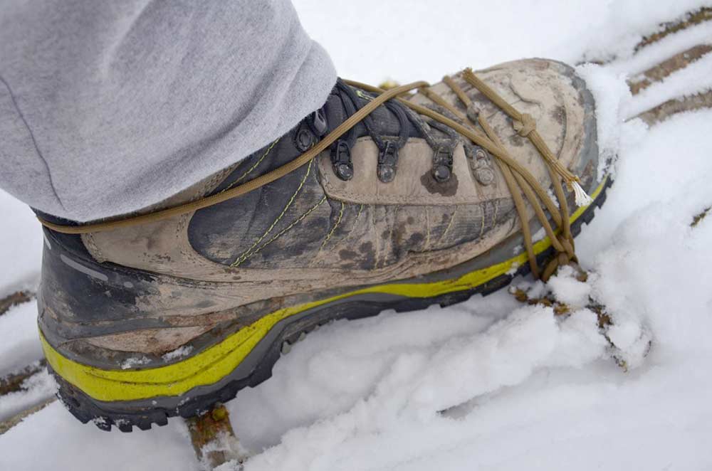 snowshoes attached to boots