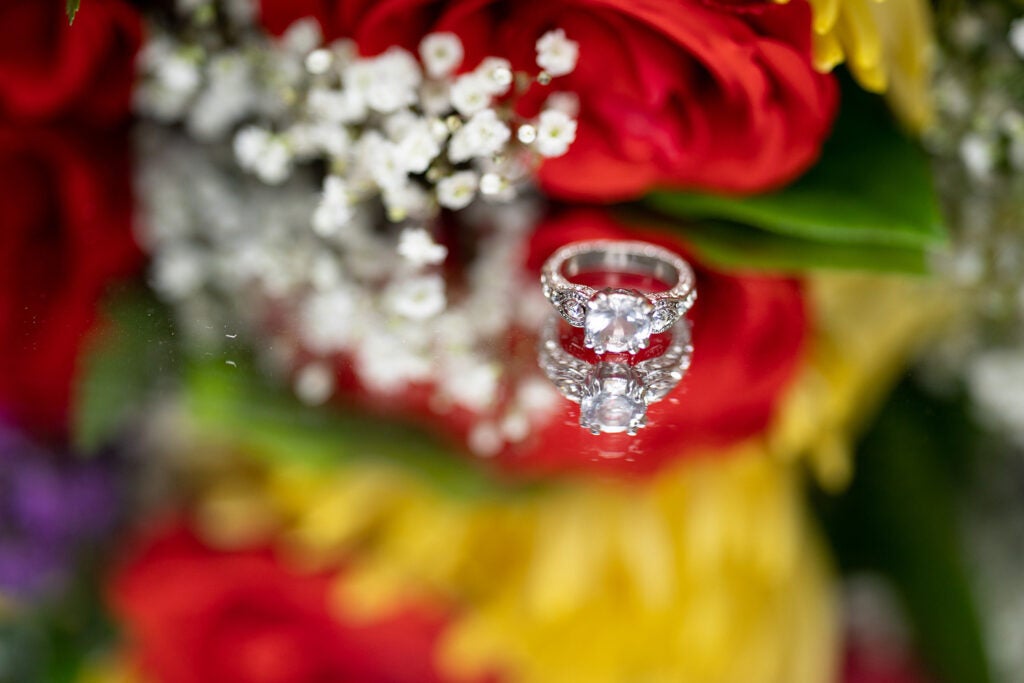wedding ring among flowers