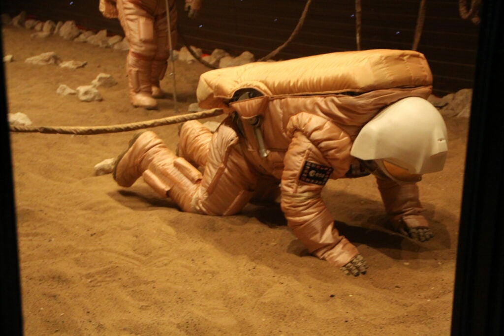 Diego Urbina tumbles over during the Mars simulation.