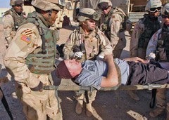 httpswww.popsci.comsitespopsci.comfilesimport2013importPopSciArticlesmock_injured_soldier.jpg