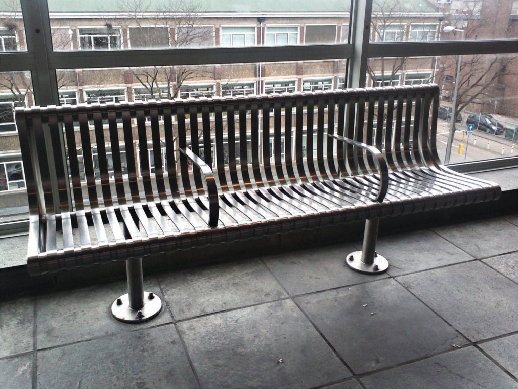 A bench in Rotterdam with arm rests designed to deter sleeping.