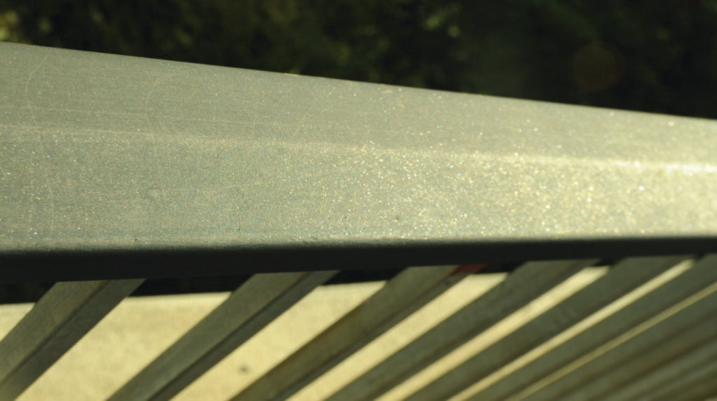 A handrail covered in sandpaper to discourage rail-sliding with skateboards.