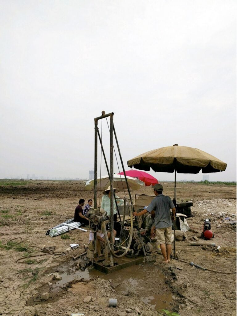 Drilling a well for groundwater near Hanoi.