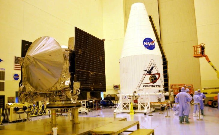 The OSIRIS-REx spacecraft and its Atlas V rocket fairing inside NASA's Payload Hazardous Servicing Facility