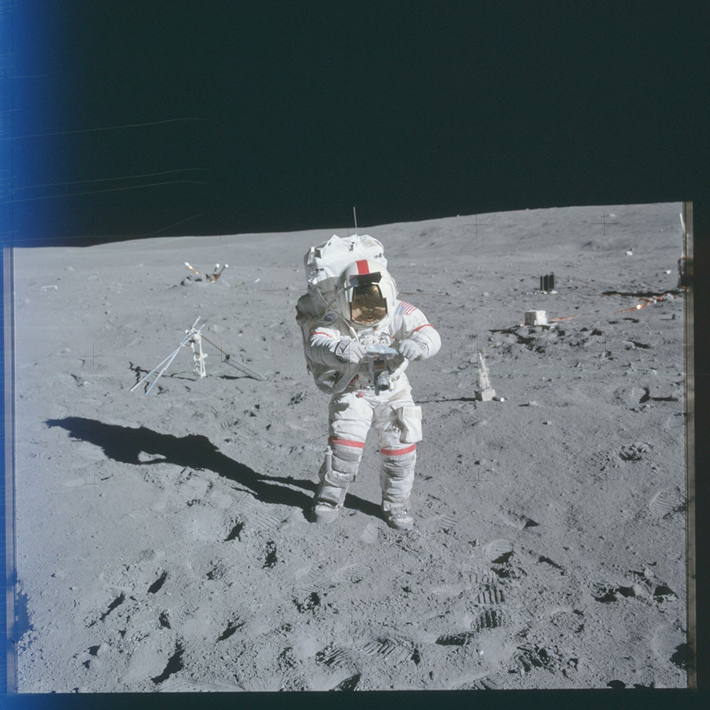 astronaut on moon with Hasselblad camera
