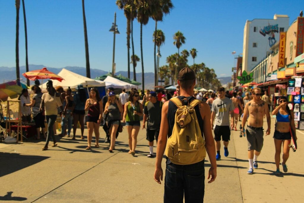 People walking along Venice Beach in Los Angeles