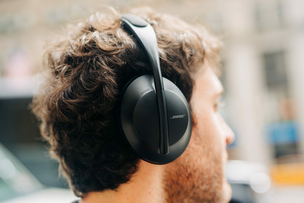 Bose 700 headphones worn by a man