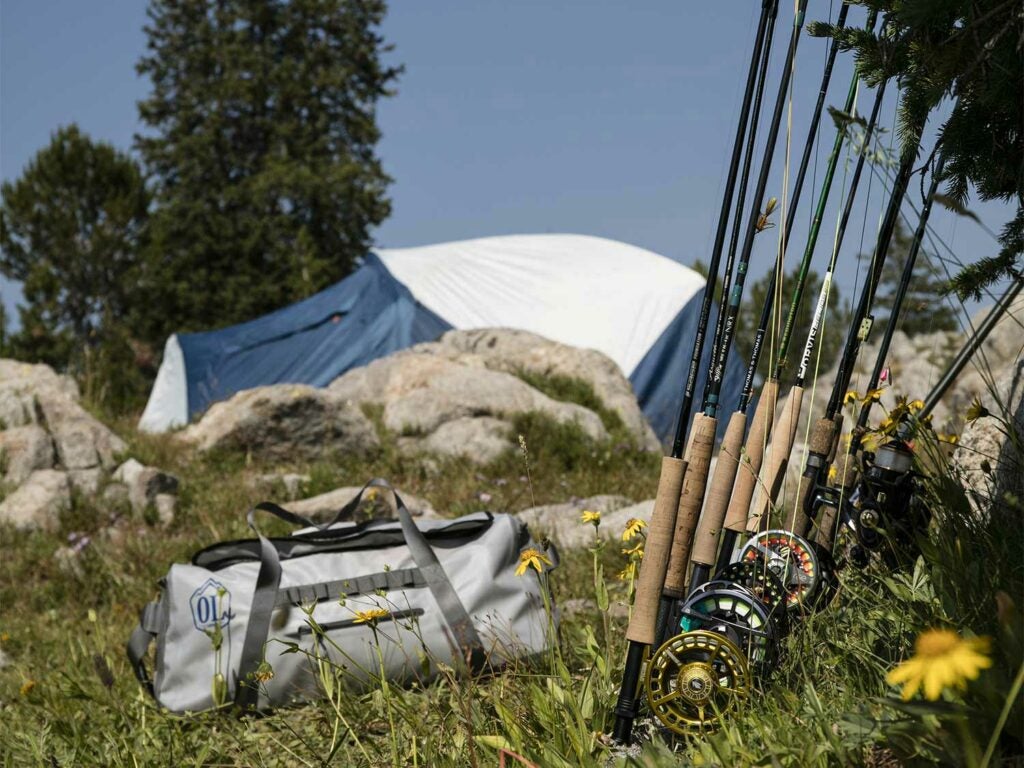 tent and fishing rods outside