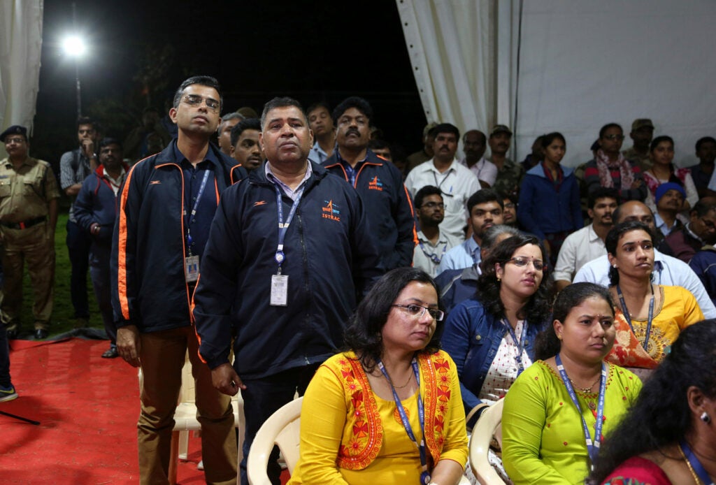 Employees from the Indian Space Research Organization looking disappointed