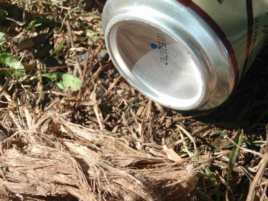 Use a the bottom of a beer can as a fire starter.