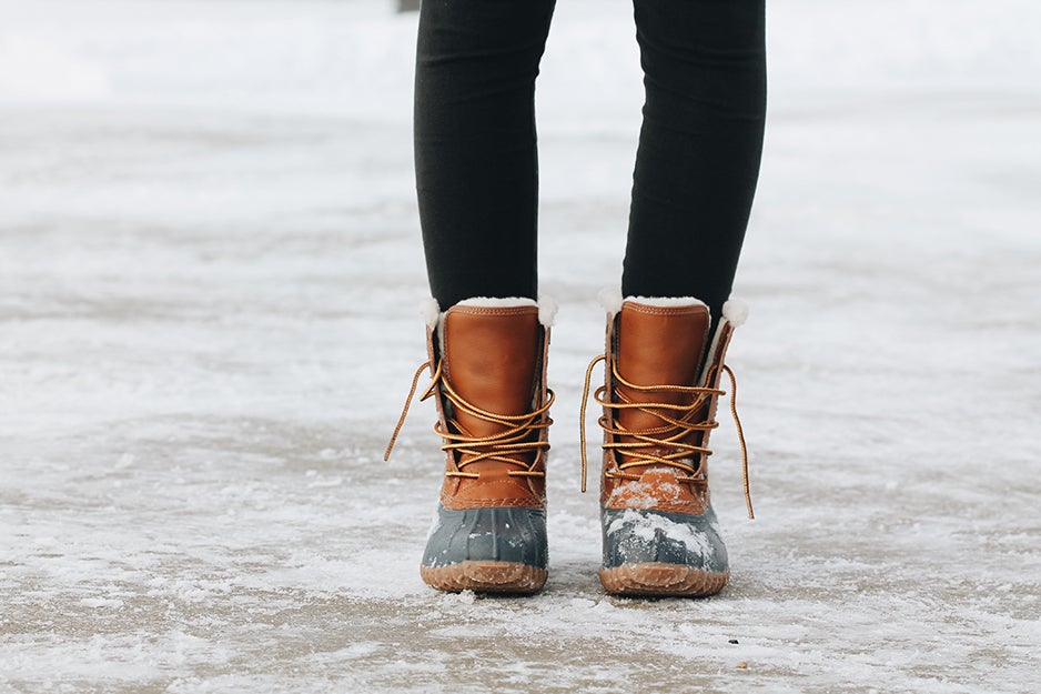 woman in boots on snow