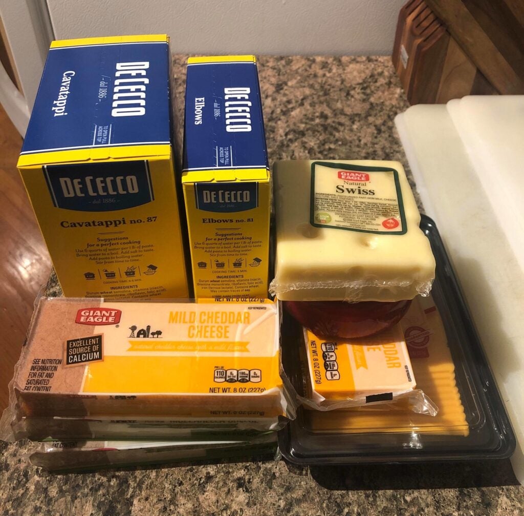 macaroni and cheese ingredients on a counter