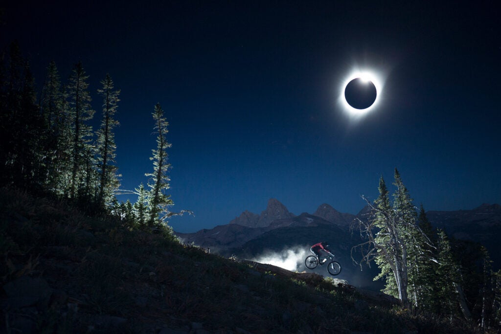 Chris Bule riding under the Total Solar Eclipse