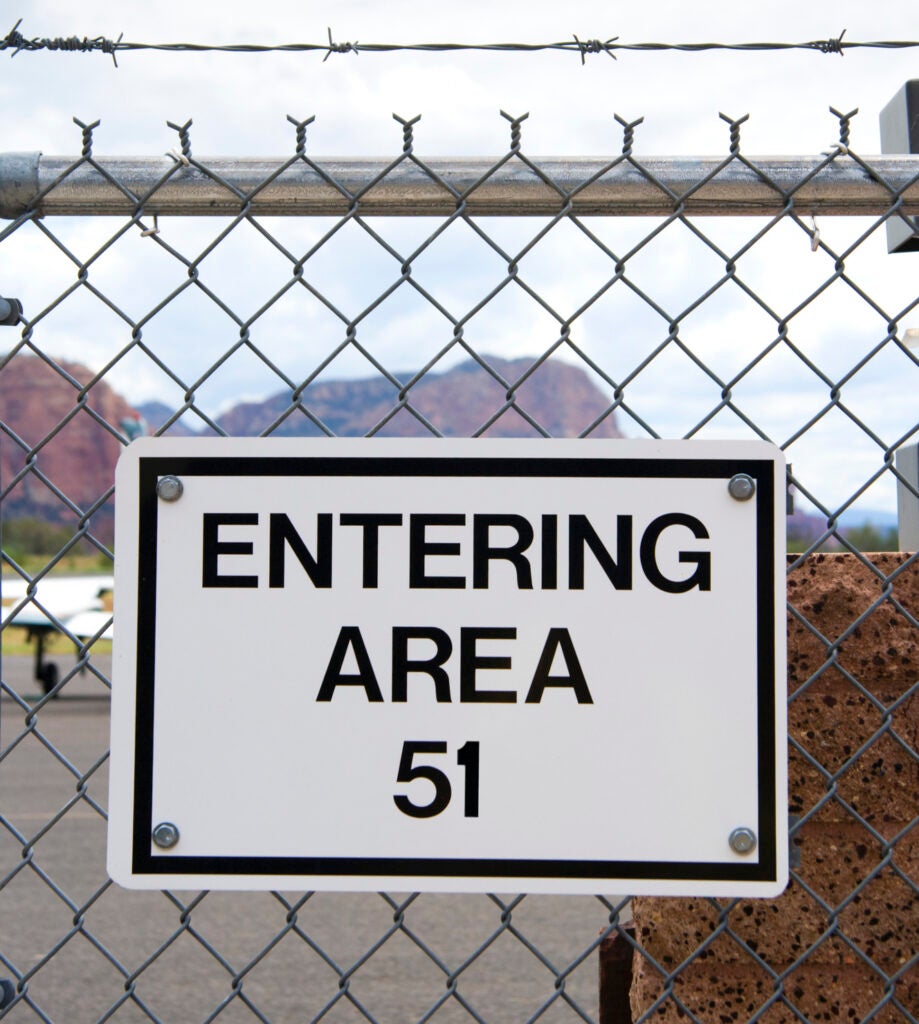 A fence sign for Area 51