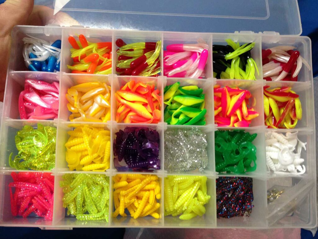 A fishing tackle box full of crappie jigs.