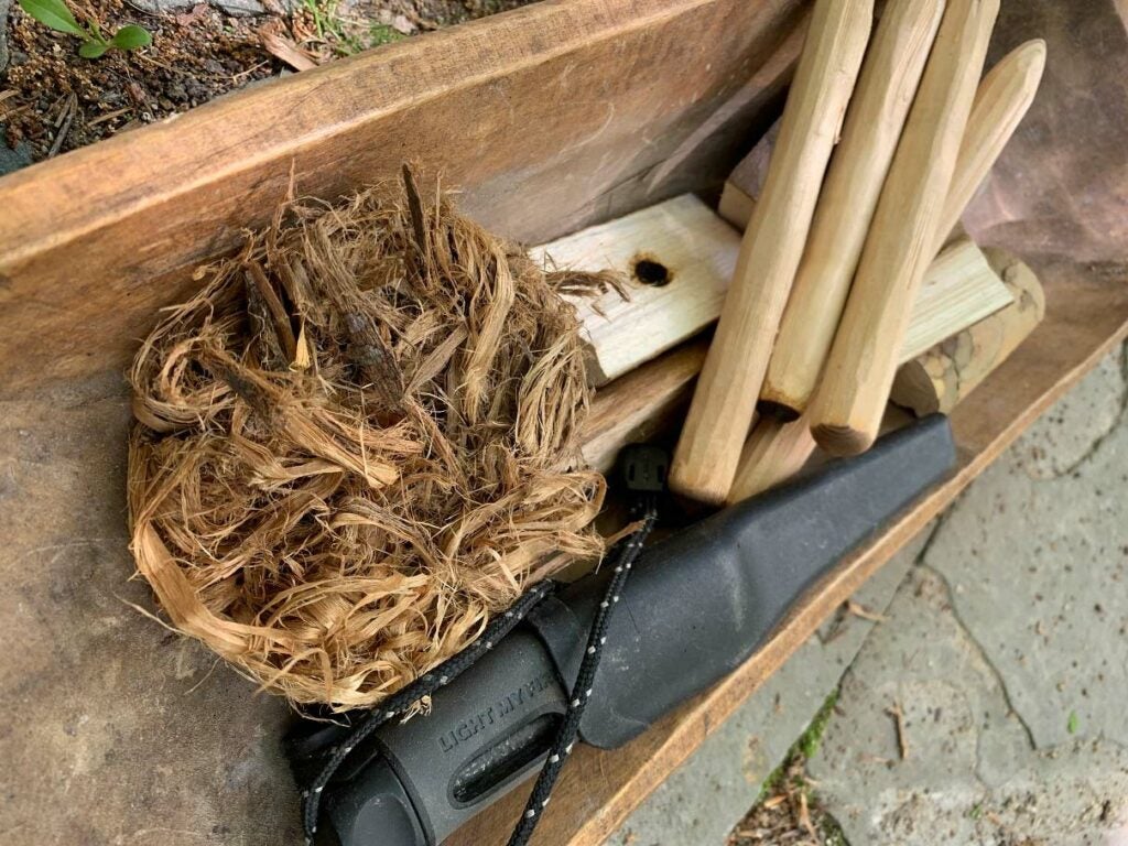 Bundles of wood and sticks for a friction fire.