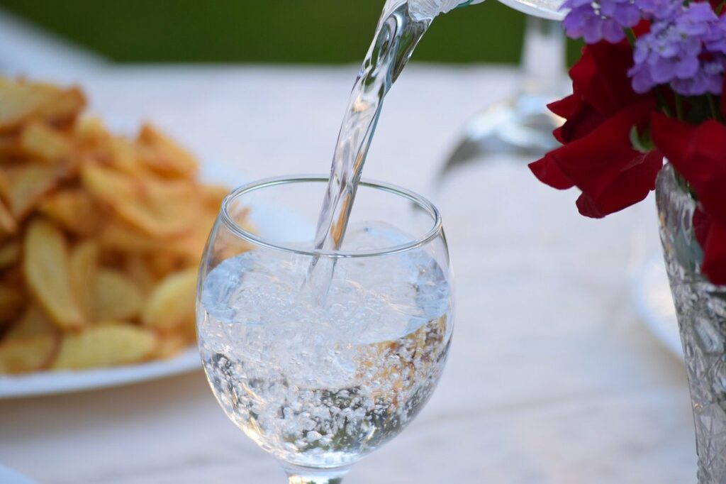 Sparkling water being poured into a glass